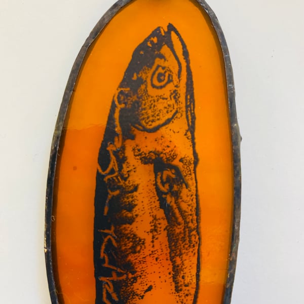 Pilchard light catcher in amber glass