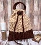 Two Tone Crochet Drawstring Pouch With Handle, Brown & Beige Small Bag - Image 1
