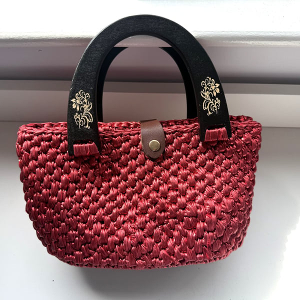 Red metallic yarn crochet handbag
