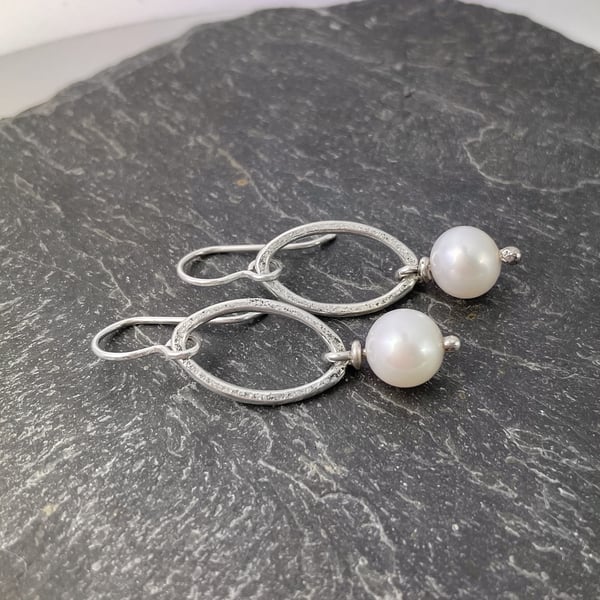 Sterling silver and pearl dangly earrings