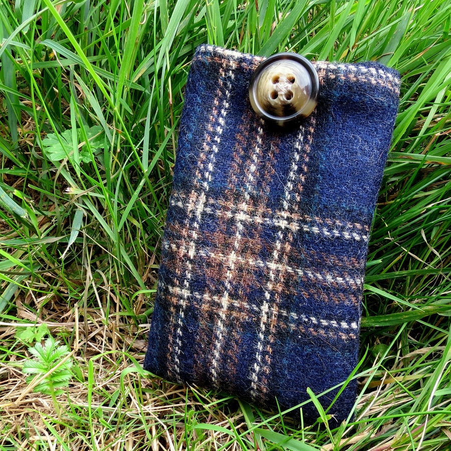 A mobile phone sleeve in tartan wool.  7.5cm x 13.5cm internal measurements.