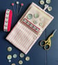 Patchwork stripe needle case made from Tilda fabric in shades of red and pink - Image 2