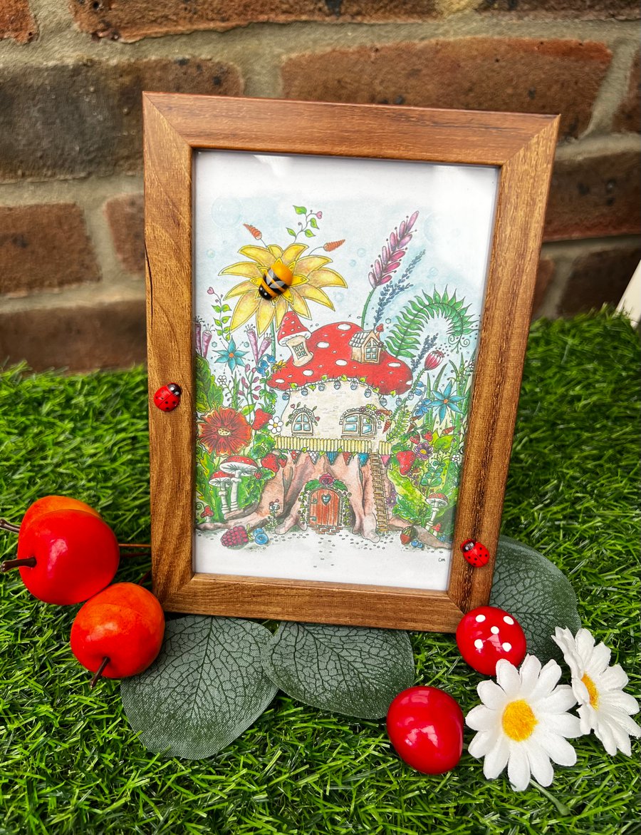 Fairy house illustration in a themed frame