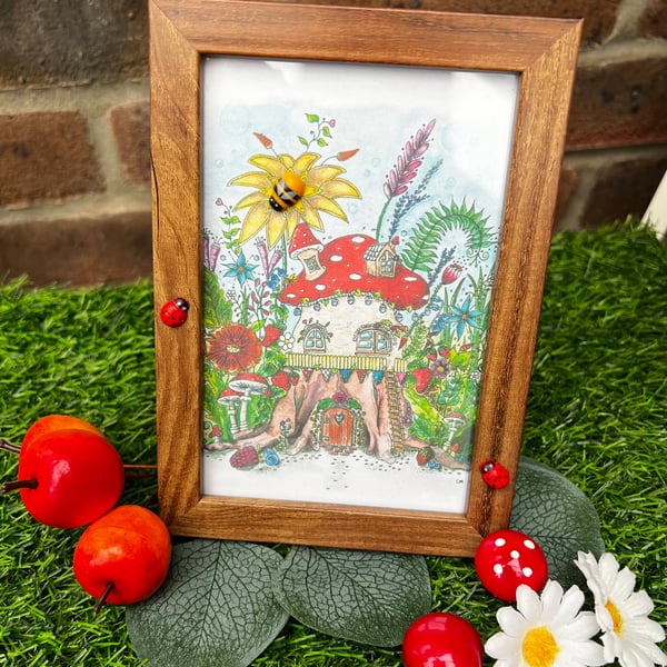 Fairy house illustration in a themed frame