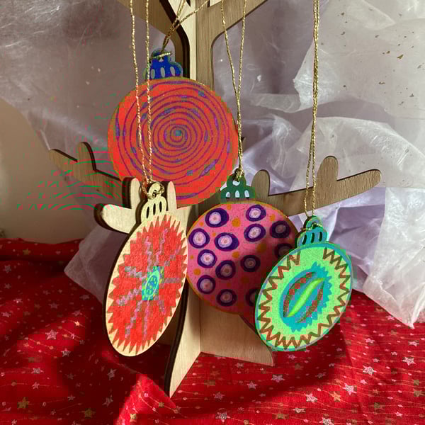  4 Christmas hand painted baubles