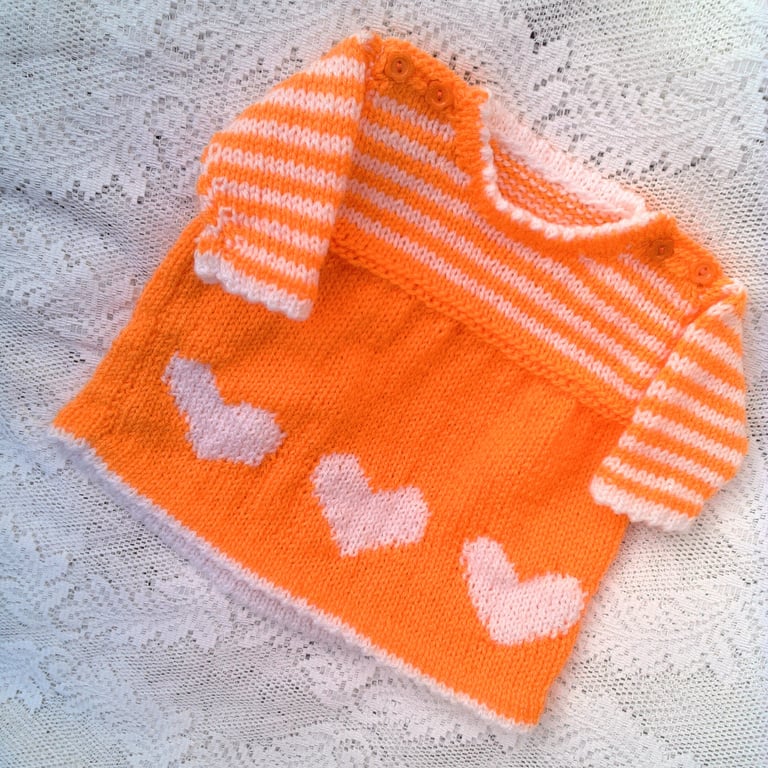 Hand Knitted Tangerine Dress with White Heart Decoration, Baby Girl's Dress