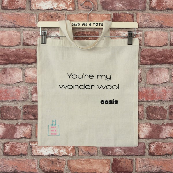Wool storage tote bag for knitting or crochet featuring an oasis song pun. 