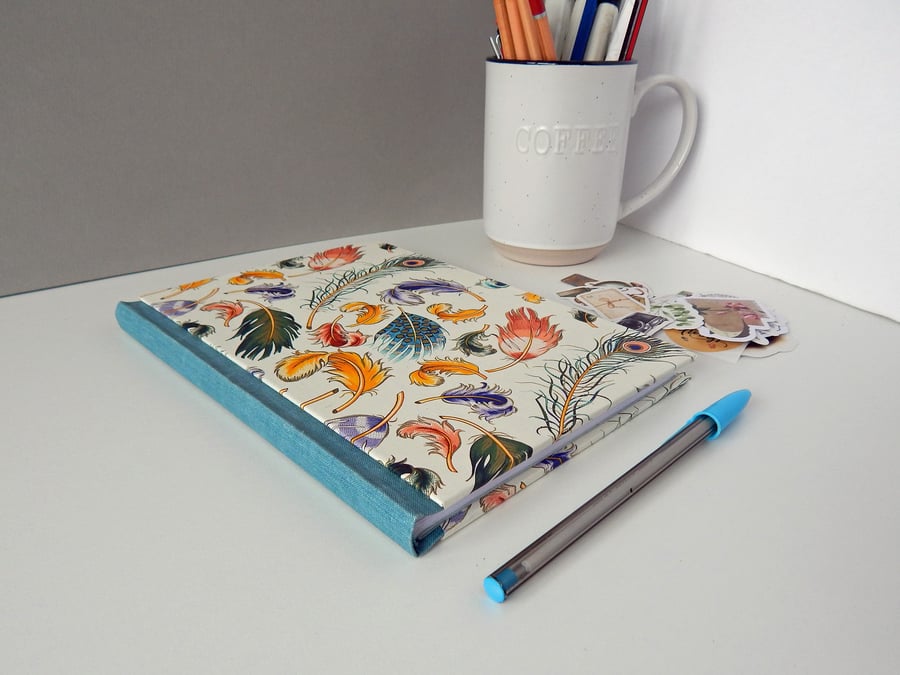 Feathers Journal, A5 with upcycled pages. Hard cover notebook, scribbler.