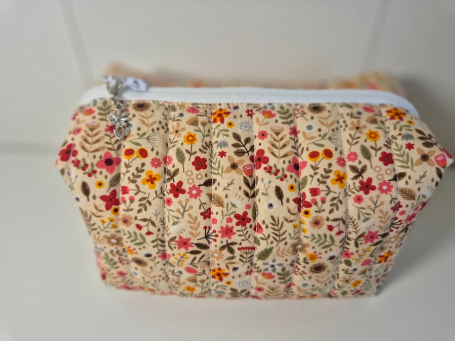 Padded floral cosmetics bag 