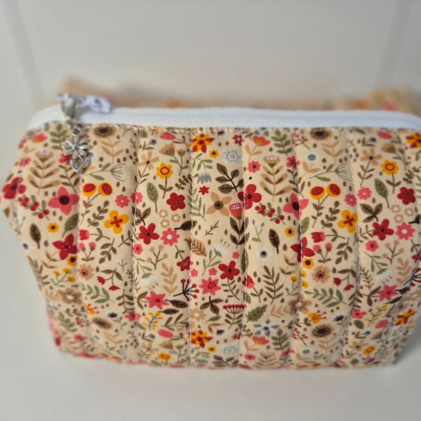 Padded floral cosmetics bag 