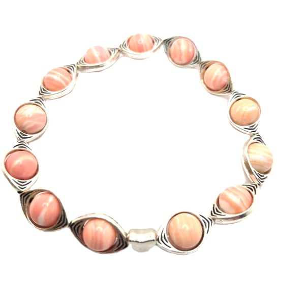 Rhodochrosite stretchy beaded bracelet with silver colured connectors