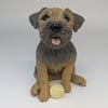 Sitting Border Terrier Sculpture (with yellow ball by feet)