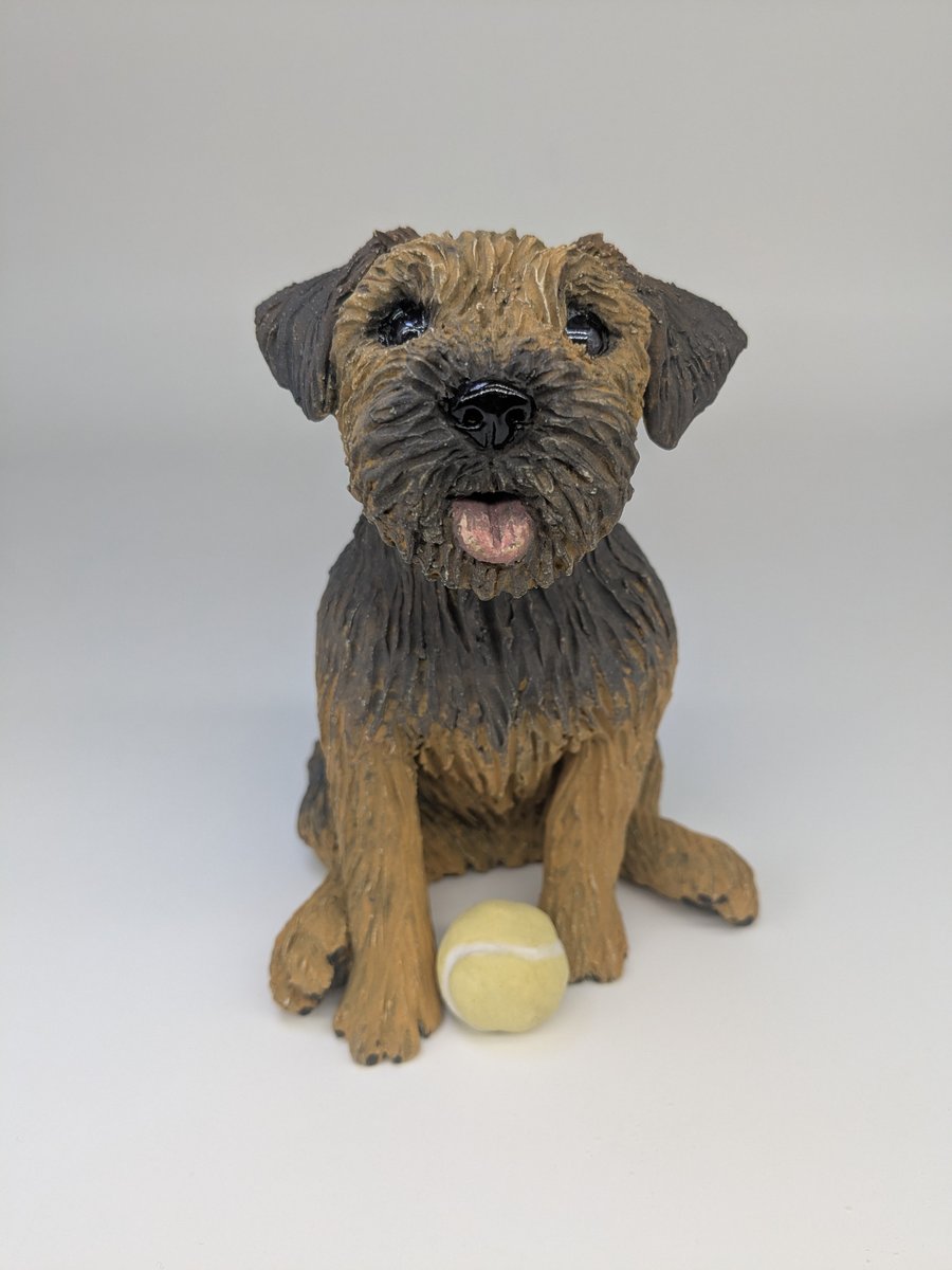 Sitting Border Terrier Sculpture (with yellow ball by feet)