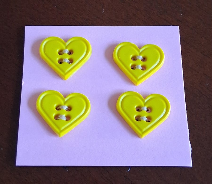 Image of 18MM YELLOW HEARTS WITH GOUR HOLES FOR ATTACHING 