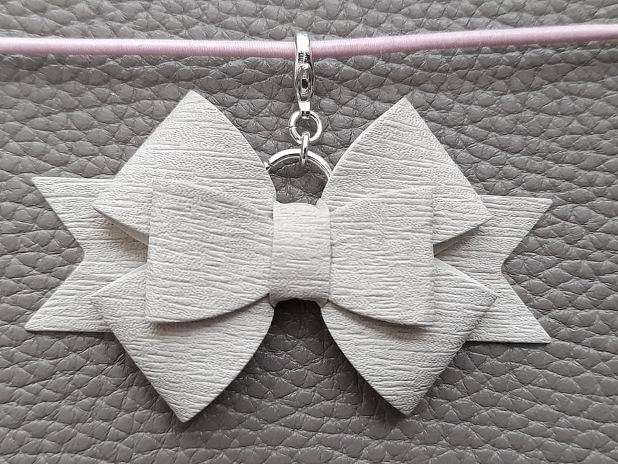 Woodgrain effect bow dangle charm planner accessory