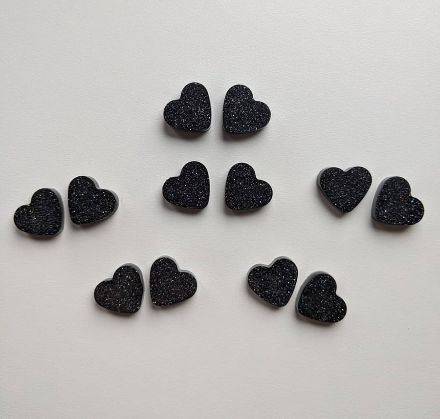 Small black sparkle hearts