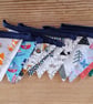 Handmade mini bunting in an animal and vehicle theme.