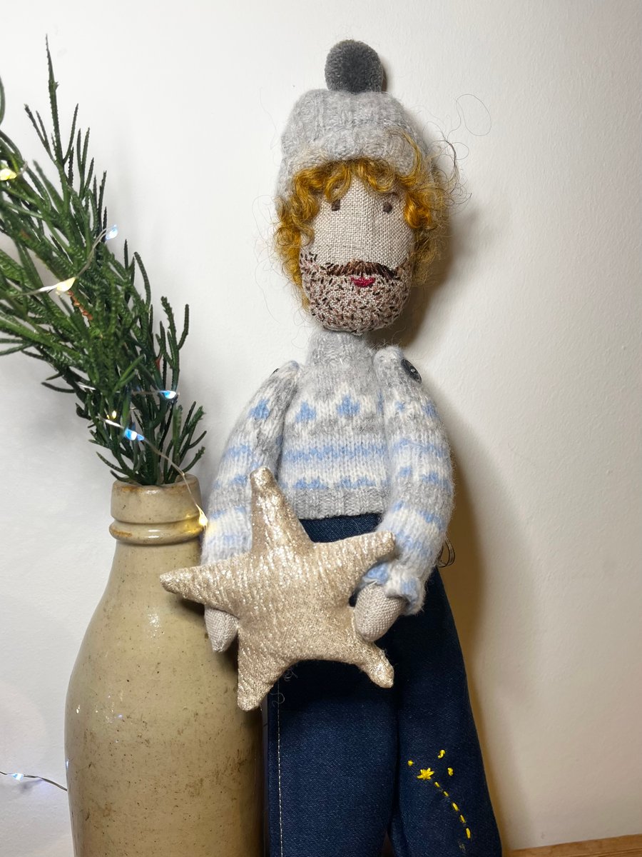 Xavier and the star Christmas tree topper reclaimed materials