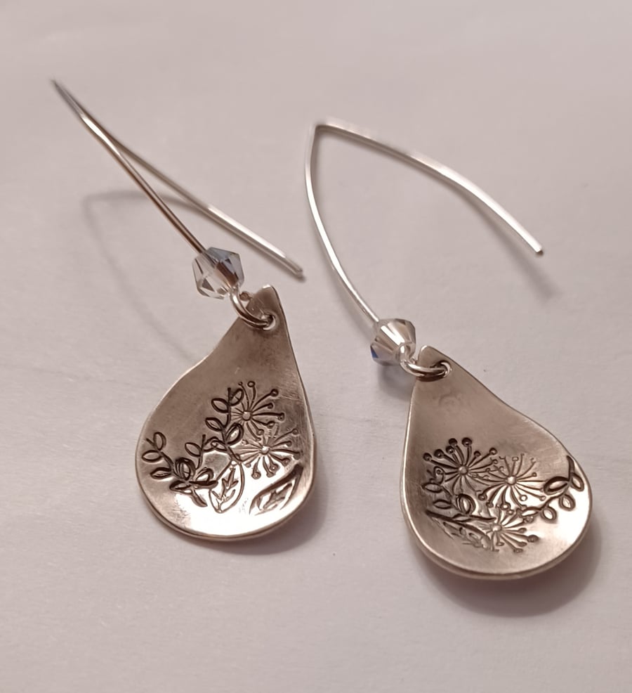 Silver flower tear earrings