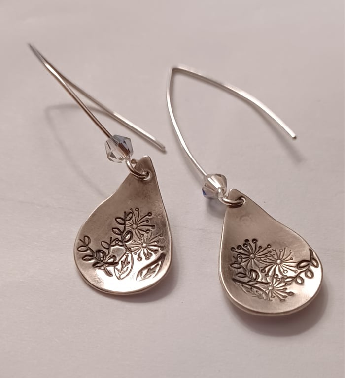 Silver flower tear earrings