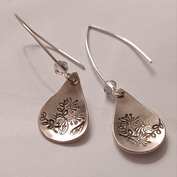 Silver flower tear earrings