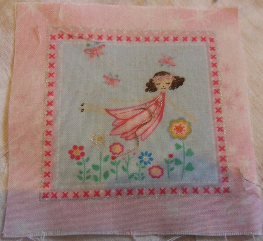 100% cotton fabric squares. Pink fairy with brown hair. (48)
