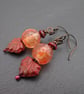 red lampwork glass leaf earrings