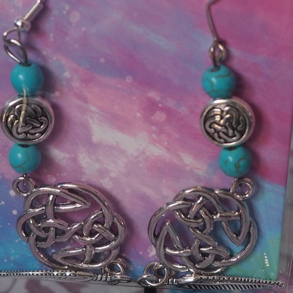 Turquoise Beaded Dangle Earrings With Metal Charms