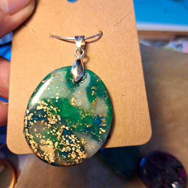 Sparkly Circled dark green, blue, white and gold flecked pendant