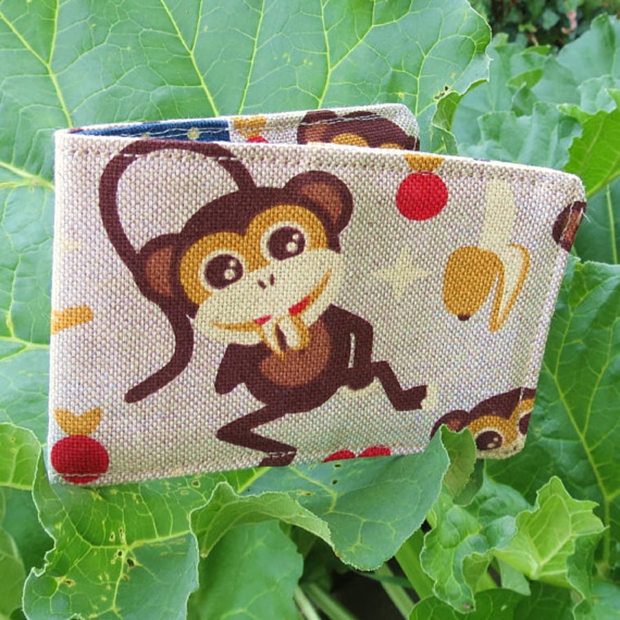 Oyster card holder. Travelcard Sleeve. A card holder with a monkeys design.