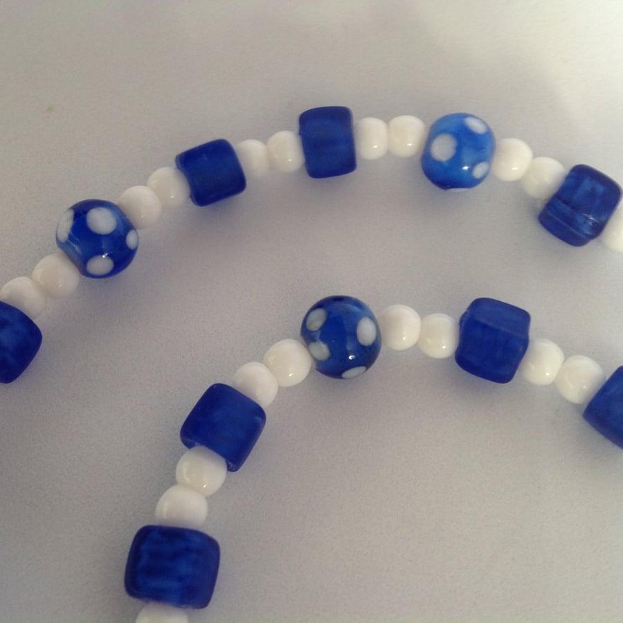 Beaded necklace with blue and white beads