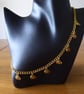 Golden Necklace with 7 Pumpkin charms
