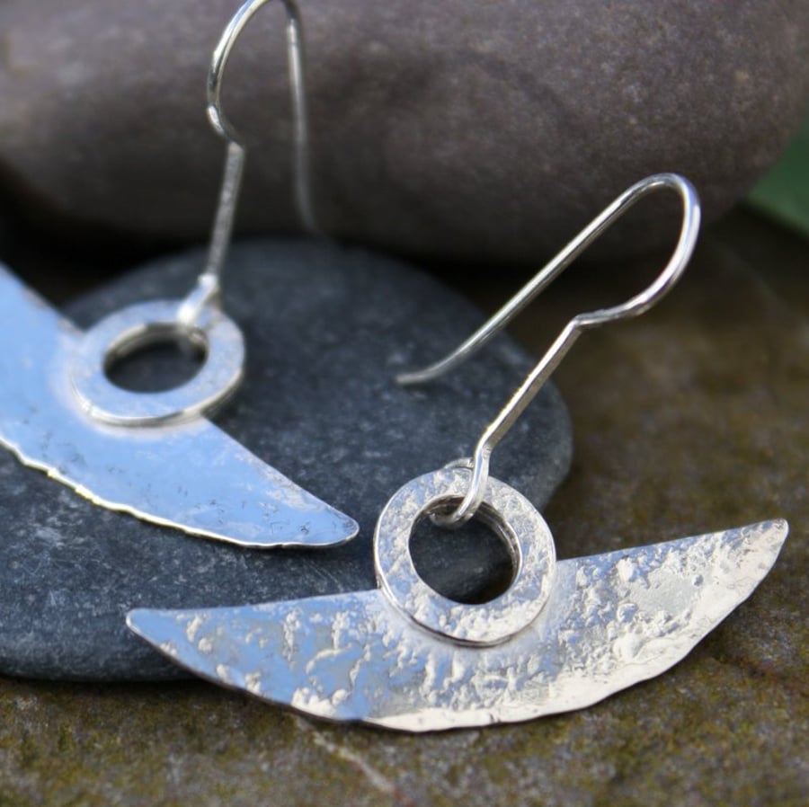 Blade tribal silver earrings.
