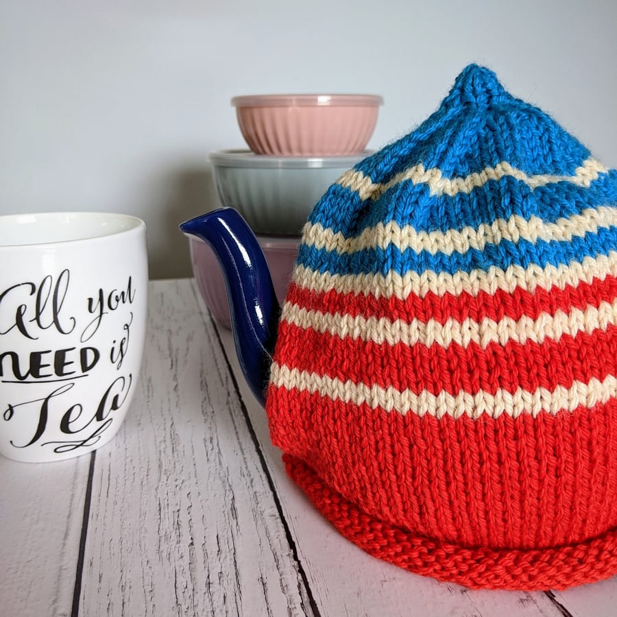 Vintage style striped knitted tea cosy.