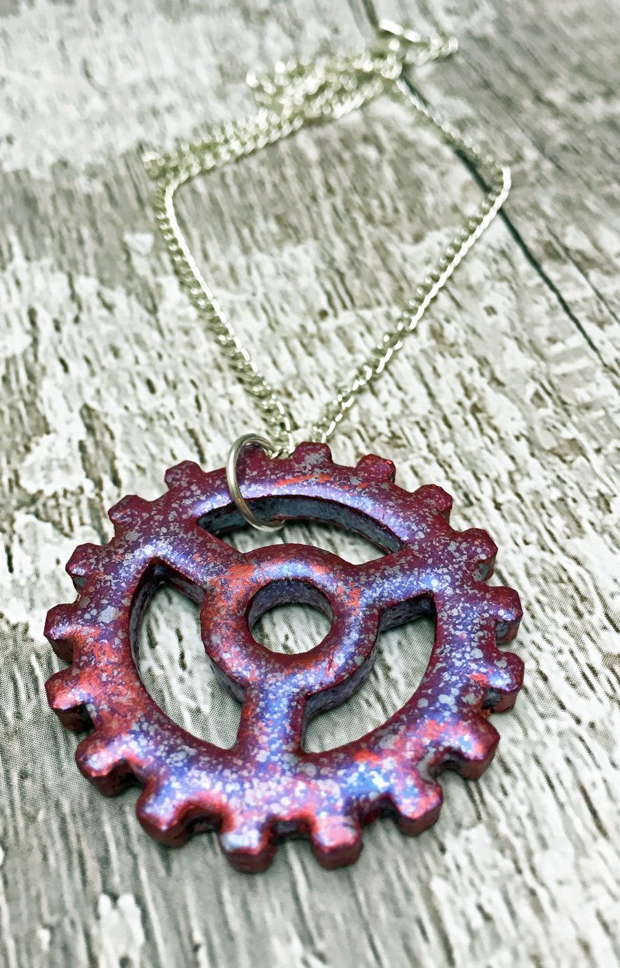 Steampunk Cog Pendant in Marbled Plum Jewel Enamels on a silver plated chain