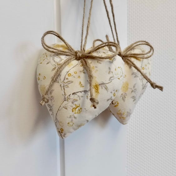 Pair heart decorations in Laura Ashley fabric yellow Summer Palace