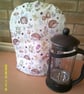 Hedgehogs, flowers and toadstools Large Coffee Pot Cosy - Image 1