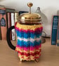 HAND KNITTED CAFETIERE COSY FOR A 1 LITRE POT IN MULTICOLOURED YARN