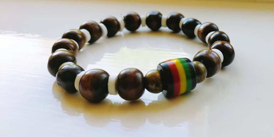 Beautiful Bracelet with Dark Wood and a Rasta Reggae Resin Bead