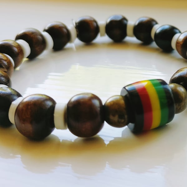 Beautiful Bracelet with Dark Wood and a Rasta Reggae Resin Bead 