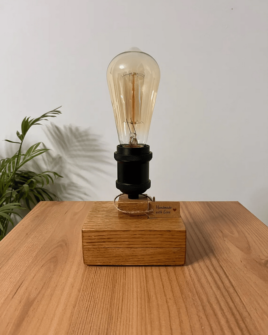 Handmade oak desk lamp on a rustic base