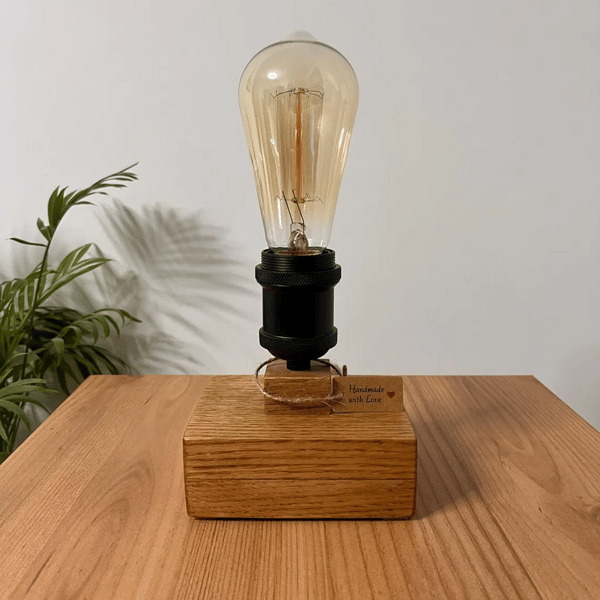 Handmade oak desk lamp on a rustic base