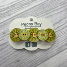 Women’s floral barrette in green and yellow