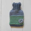 SALE : Hot water bottle cover with daisy stitch detail - green
