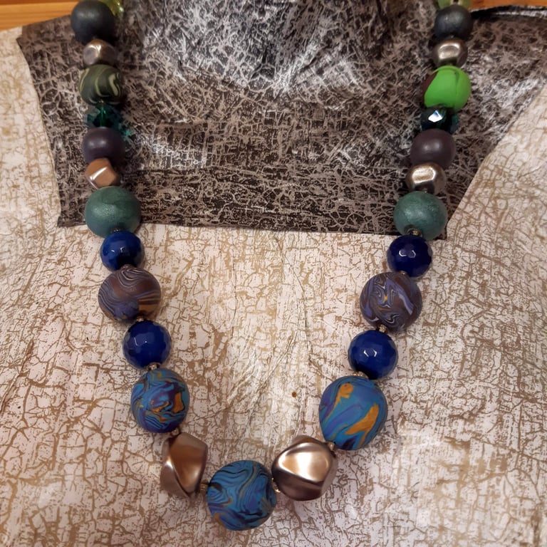 Longer length multi coloured necklace