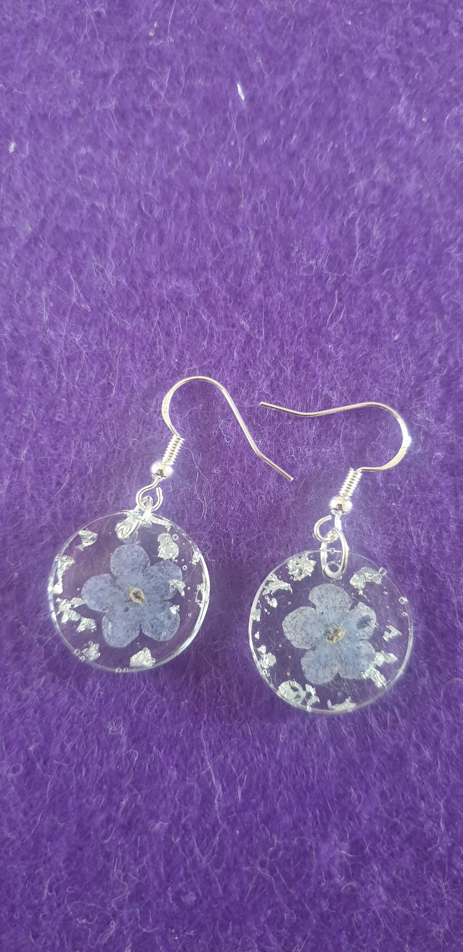 Round blue forget me not resin earrings