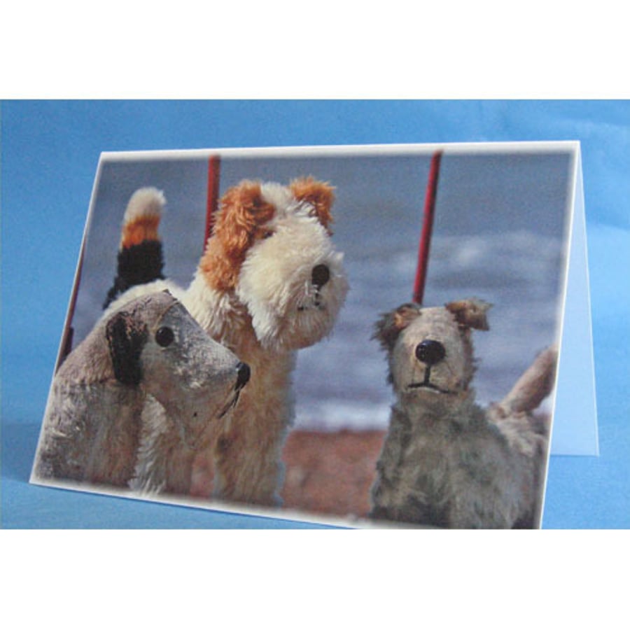 Trio of Dog on Wheels Toys Greeting Card