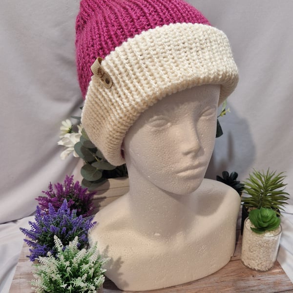 Knitted childs pompom hat in light Burgundy 