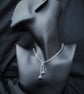 Sterling silver pendant with two black onyx cabochons - Image 1