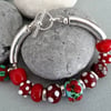 SALE!! was 15 pounds now 12 pounds Handmade Lampwork bead and ceramic bracelet